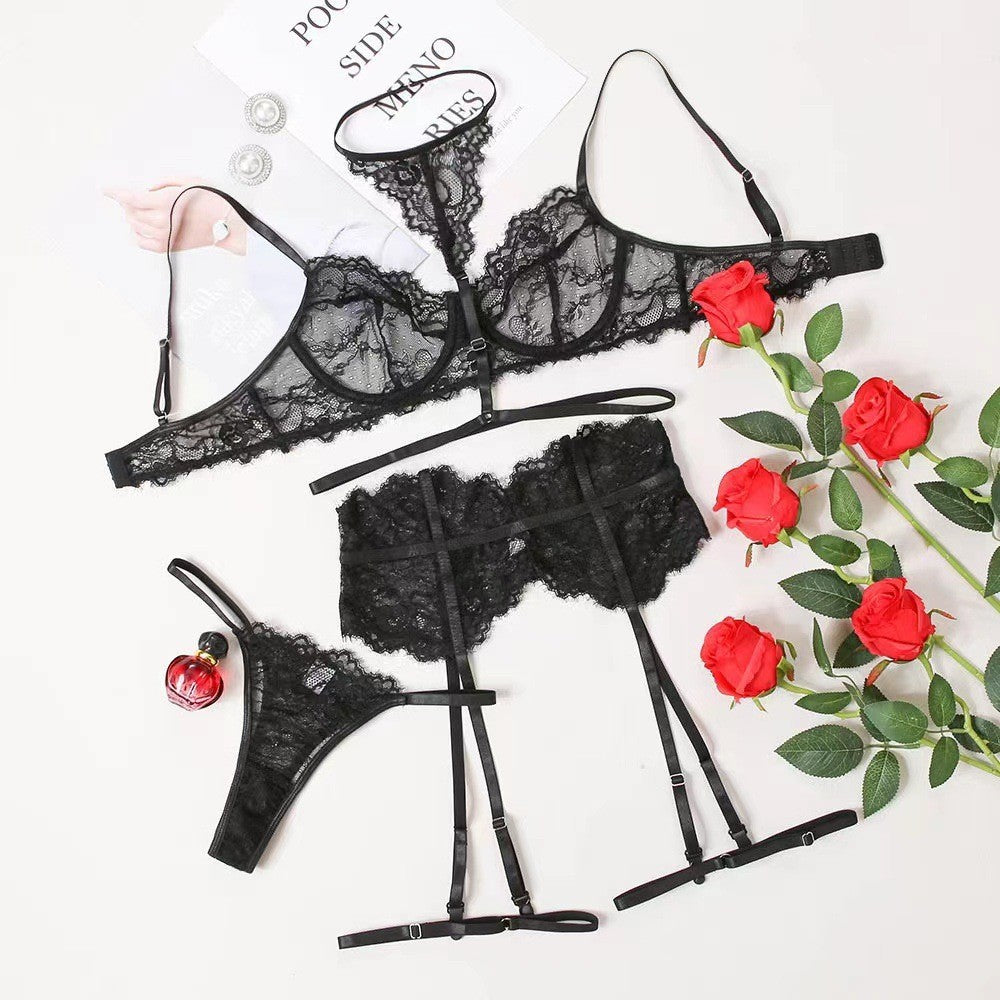 Conjunto Isolde NuAuge preto - still de produto disposto sobre fundo claro com rosas vermelhas e revista
