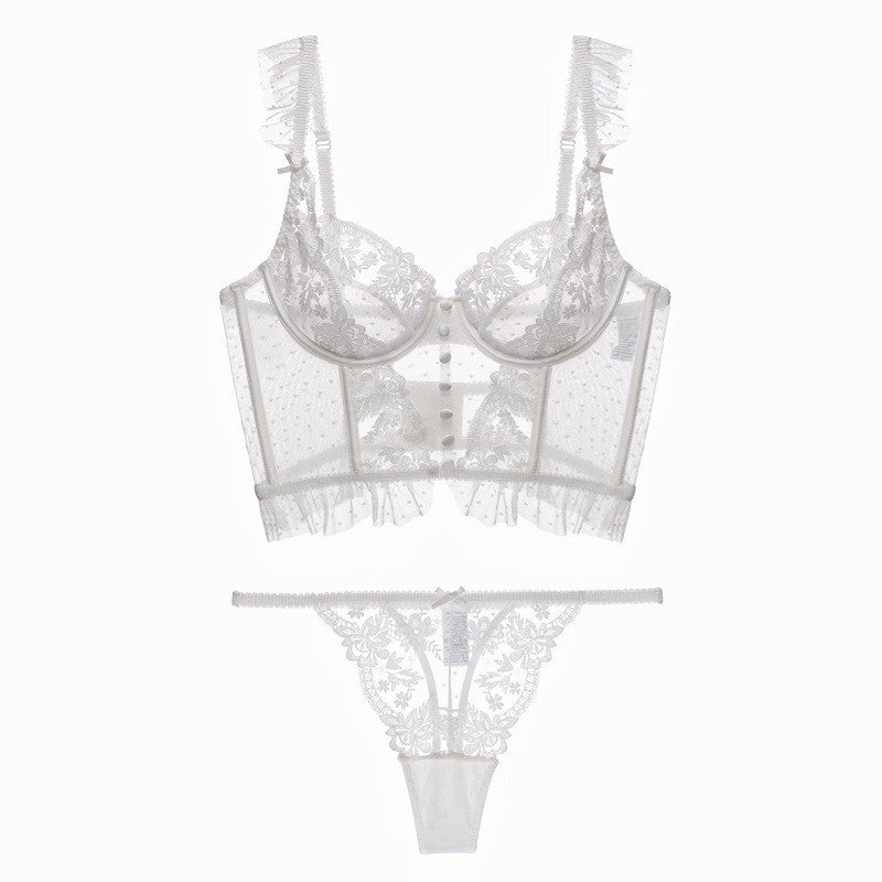 Conjunto Cosette Branco, frente. Sutiã longline underwire com renda floral bordada e tule poá. Calcinha fio dental.