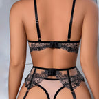 Conjunto Vivienne preto costas. Sutiã aro, bordados renda e mesh transparente, cinta-liga.