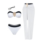 Conjunto Santorini branco NuAuge: Top tomara-que-caia bojo, broche dourado, calcinha e saia longa, faixas pretas. Frente.
