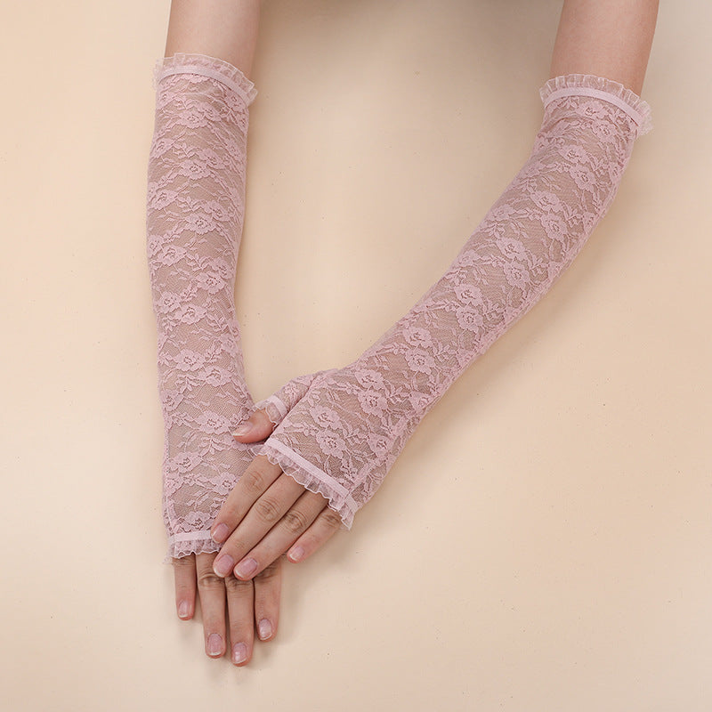 Luva Valeria rosa, renda floral fingerless estilo retrô. Vista de frente, detalhe elegante de babado nos punhos.